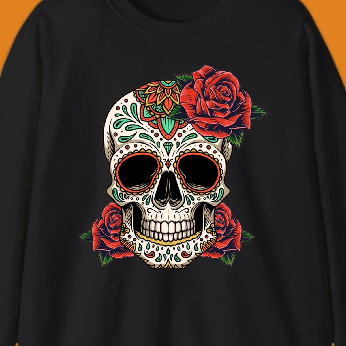 An intricately decorated calavera with red roses, featuring vibrant patterns in green, orange, and teal.