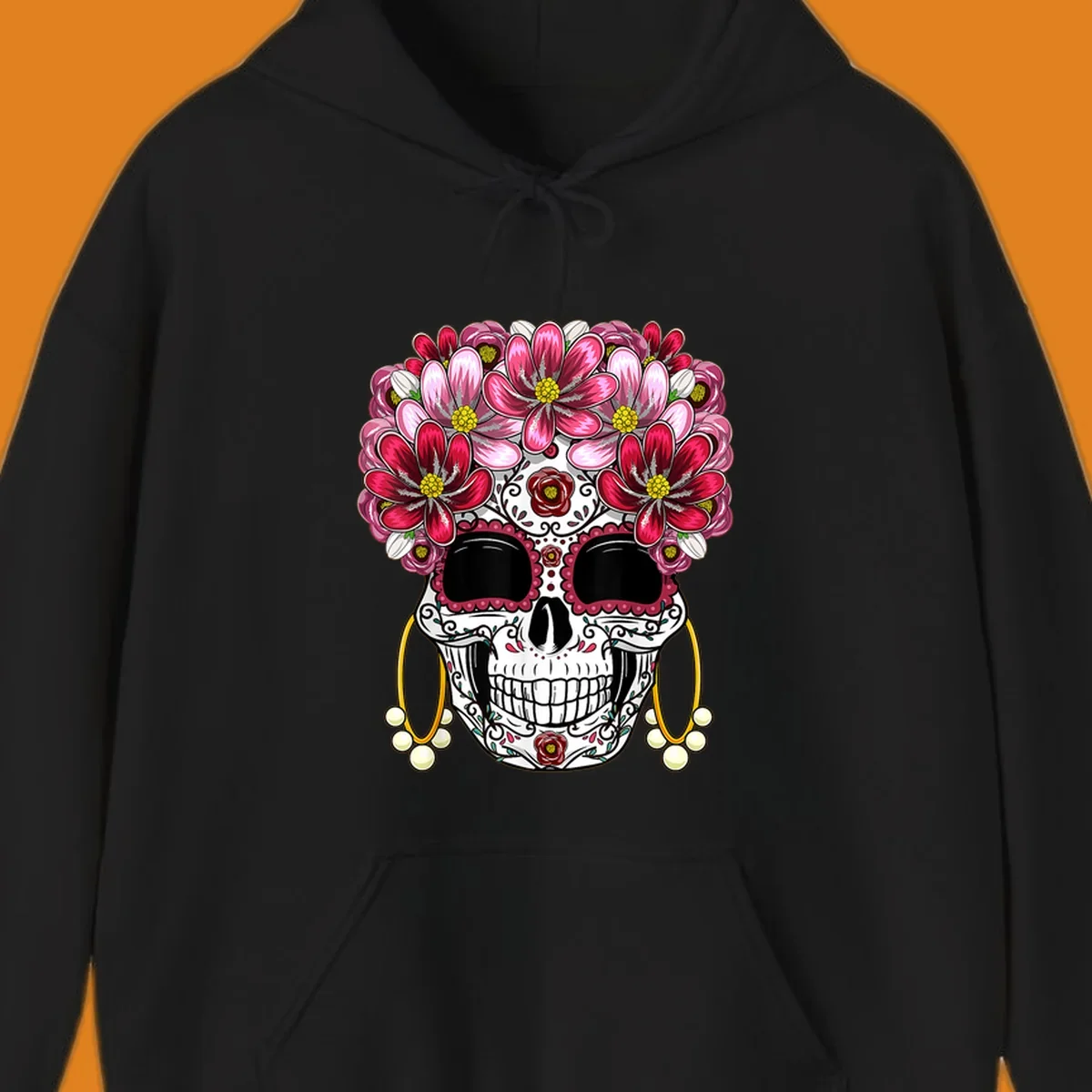 An ornate floral sugar skull with a crown of pink and red flowers, scrollwork, and pearl earrings on a black background.