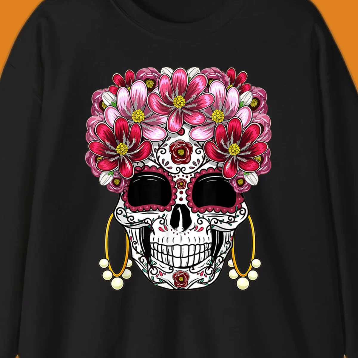 An ornate floral sugar skull with a crown of pink and red flowers, scrollwork, and pearl earrings on a black background.