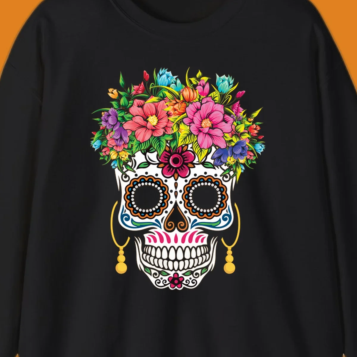 A vibrant floral calavera skull with a large, colorful flower crown and decorative patterns, featuring gold earrings.