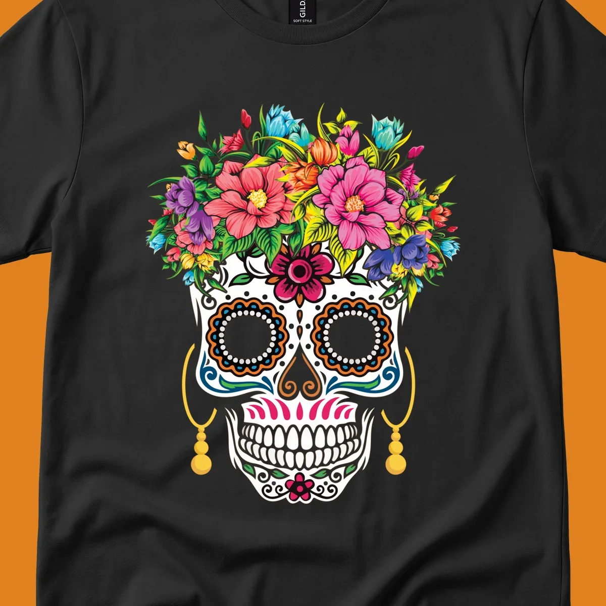 A vibrant floral calavera skull with a large, colorful flower crown and decorative patterns, featuring gold earrings.