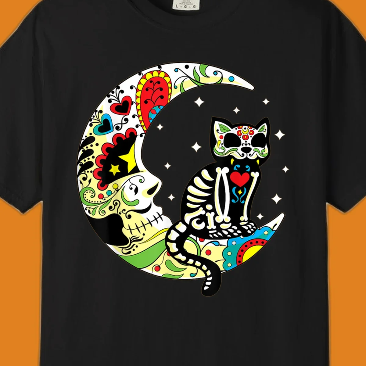 A colorful sugar skull cat with a skeleton body sits on a crescent moon decorated with skull and floral patterns. Features a sugar-skull-cat-moon.