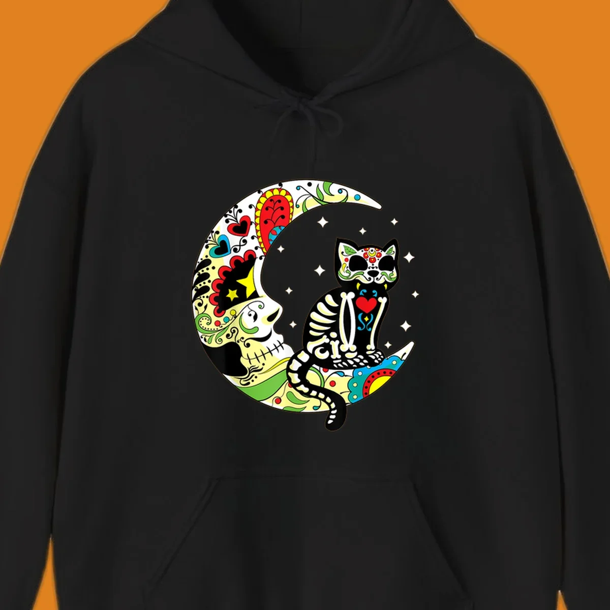 A colorful sugar skull cat with a skeleton body sits on a crescent moon decorated with skull and floral patterns. Features a sugar-skull-cat-moon.