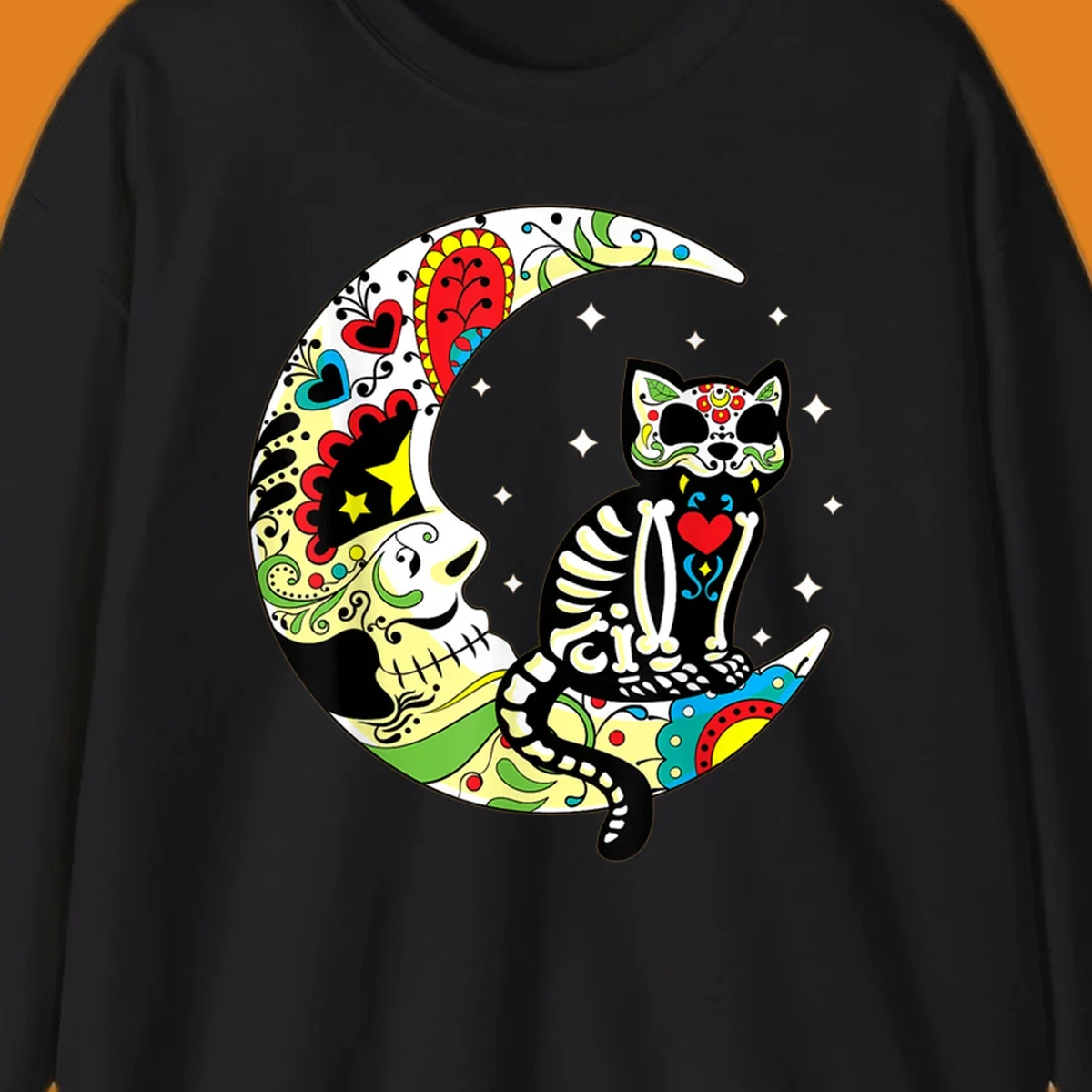 A colorful sugar skull cat with a skeleton body sits on a crescent moon decorated with skull and floral patterns. Features a sugar-skull-cat-moon.