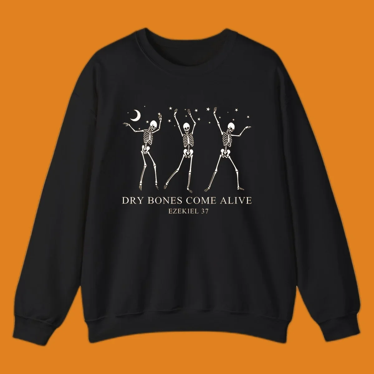 Three dancing skeletons under a moon and stars, with text 'Dry Bones Come Alive Ezekiel 37'.