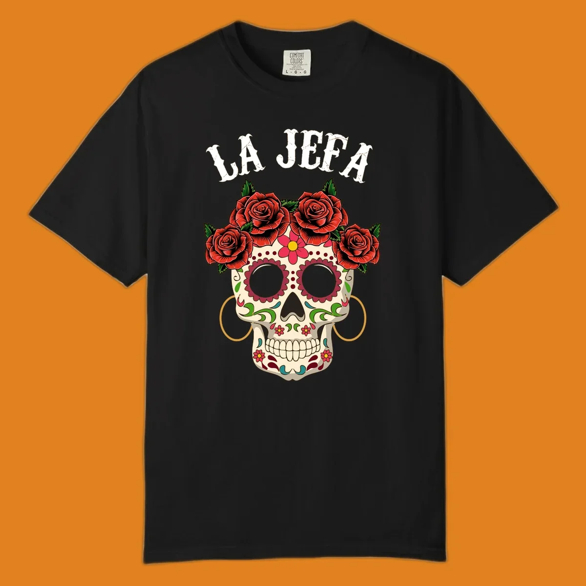 A colorful La Jefa sugar skull design with a crown of red roses and gold hoop earrings.
