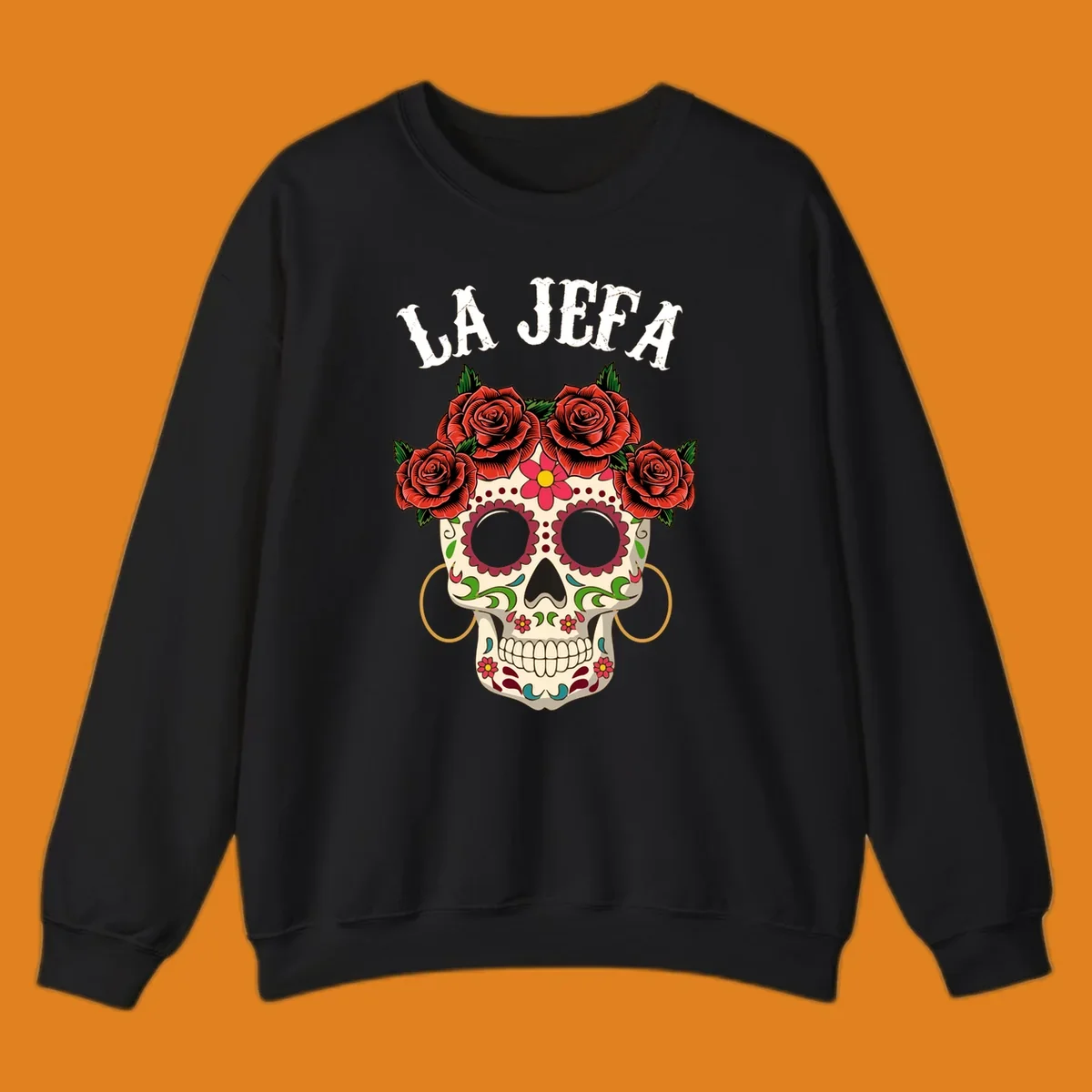 A colorful La Jefa sugar skull design with a crown of red roses and gold hoop earrings.