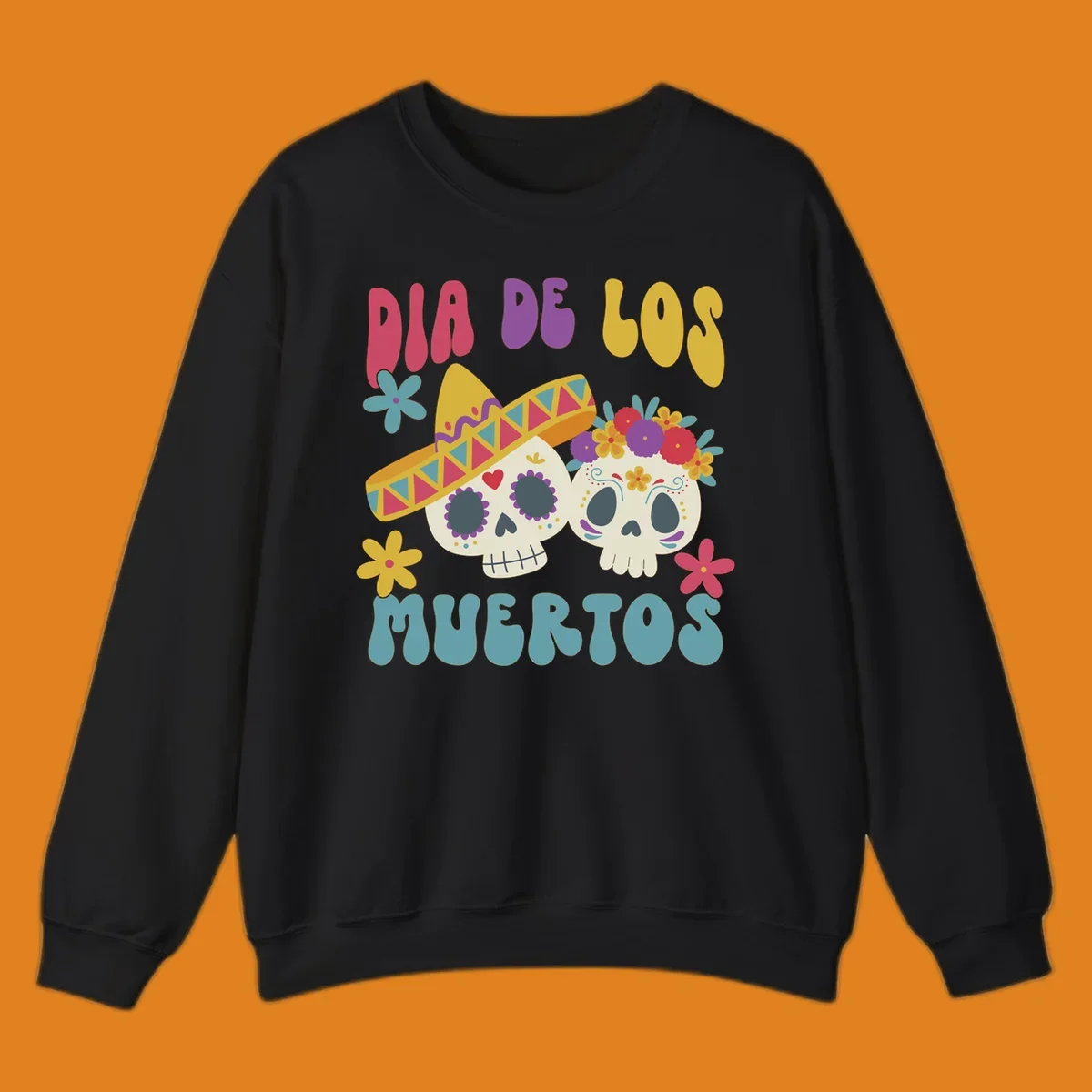 Two vibrant Dia de los Muertos sugar skulls, one wearing a sombrero and the other a flower crown, surrounded by colorful flowers and text that reads DIA DE LOS MUERTOS.