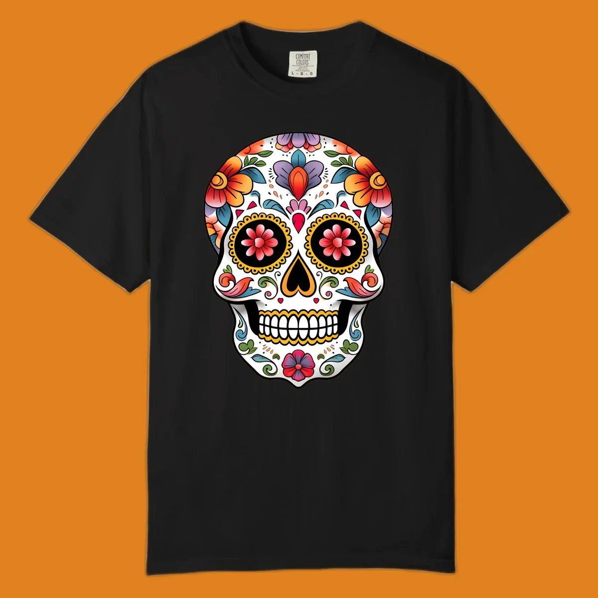 A vibrant floral calavera sugar skull illustration with orange, red, purple, and blue flowers, yellow accents, and hearts.