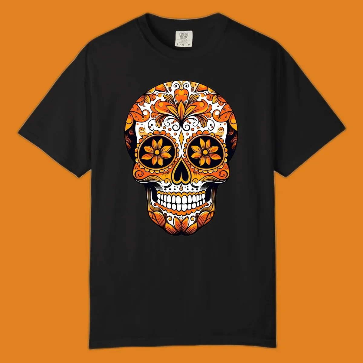 A vibrant marigold calavera skull illustration with intricate orange and yellow floral patterns on a black and white background.