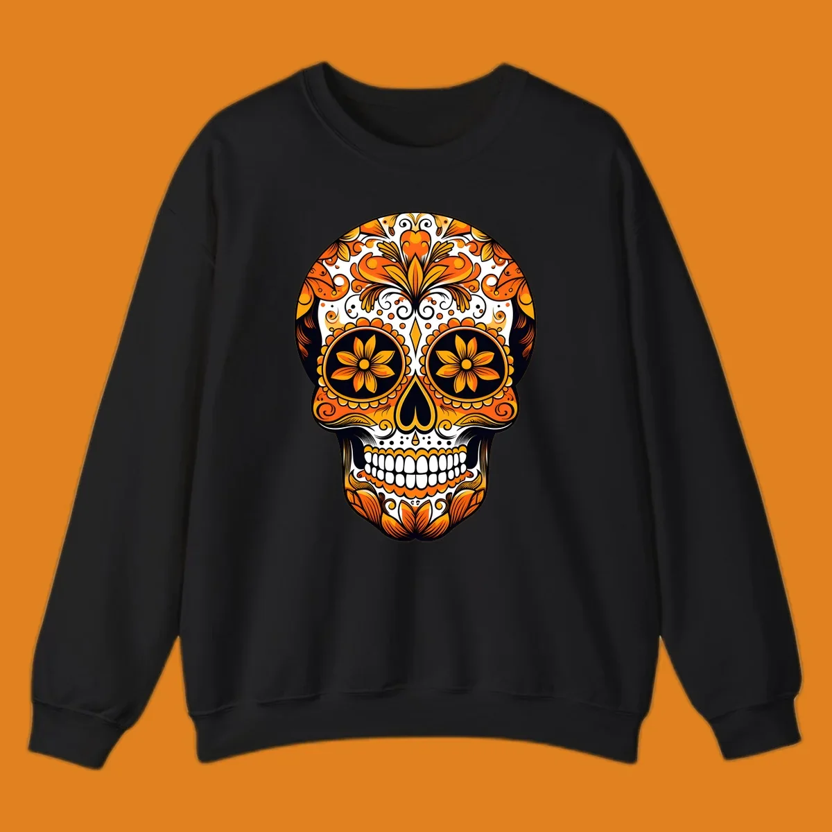 A vibrant marigold calavera skull illustration with intricate orange and yellow floral patterns on a black and white background.
