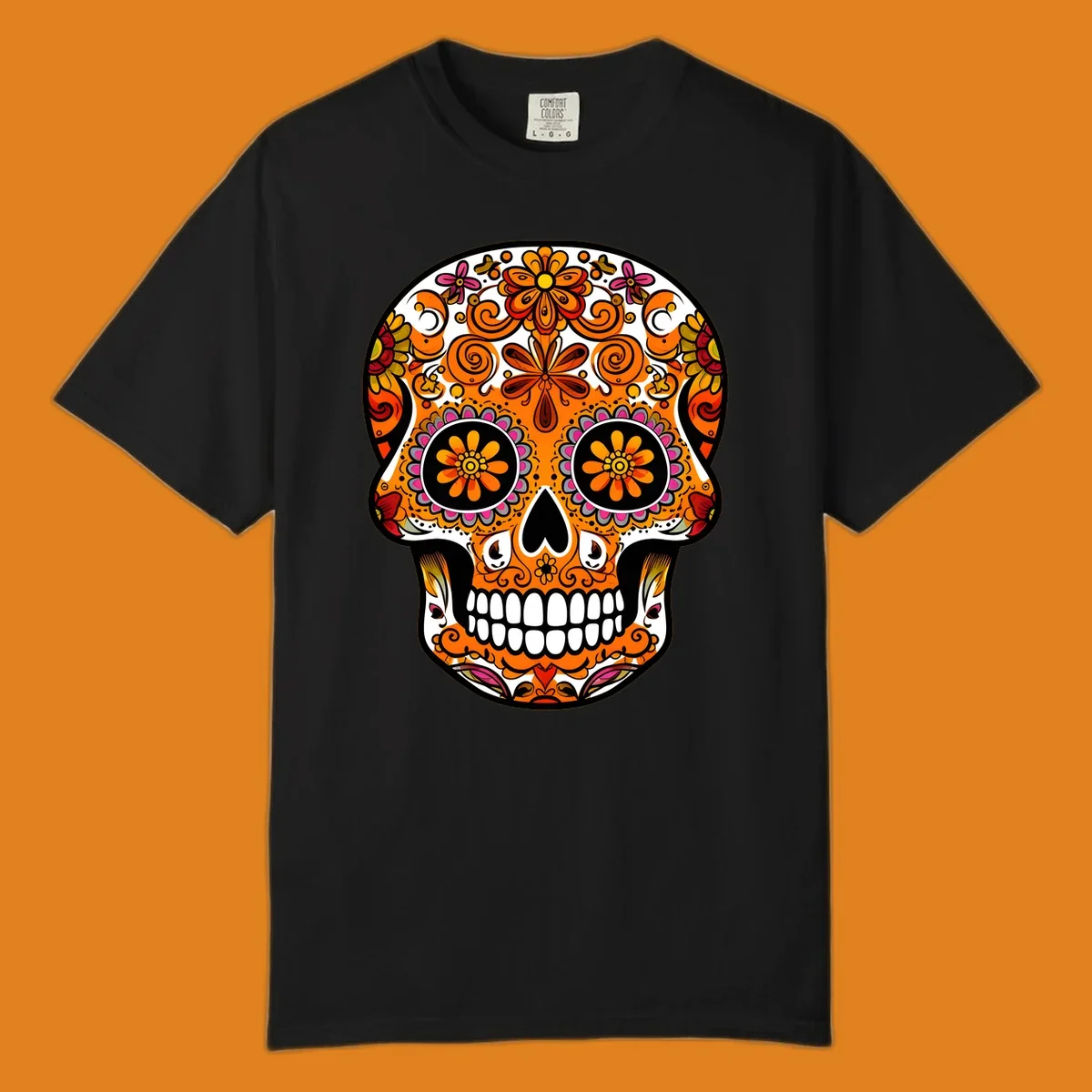 A vibrant, ornate floral calavera skull with orange, pink, yellow, and red patterns, outlined in white and black.