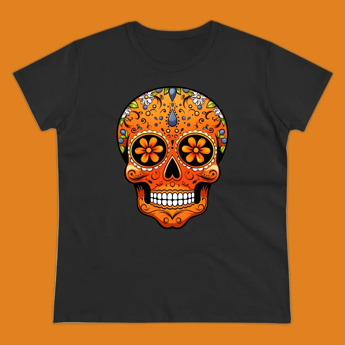 A vibrant orange calavera sugar skull with blue and white flowers, green leaves, and intricate swirling patterns.
