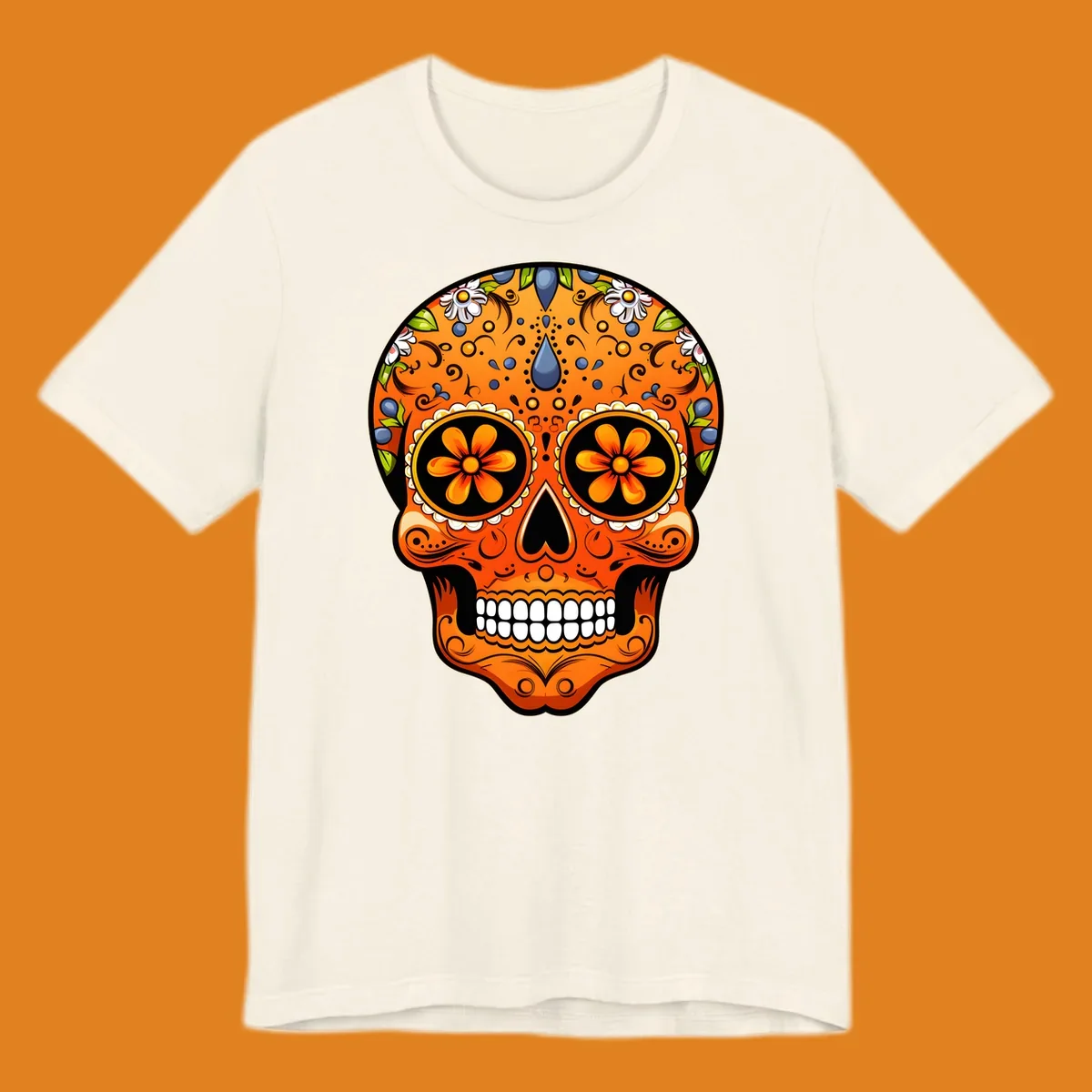 A vibrant orange calavera sugar skull with blue and white flowers, green leaves, and intricate swirling patterns.