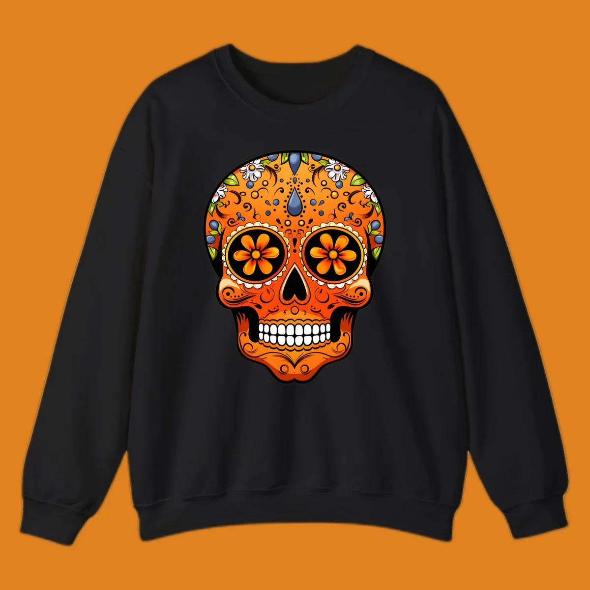 A vibrant orange calavera sugar skull with blue and white flowers, green leaves, and intricate swirling patterns.