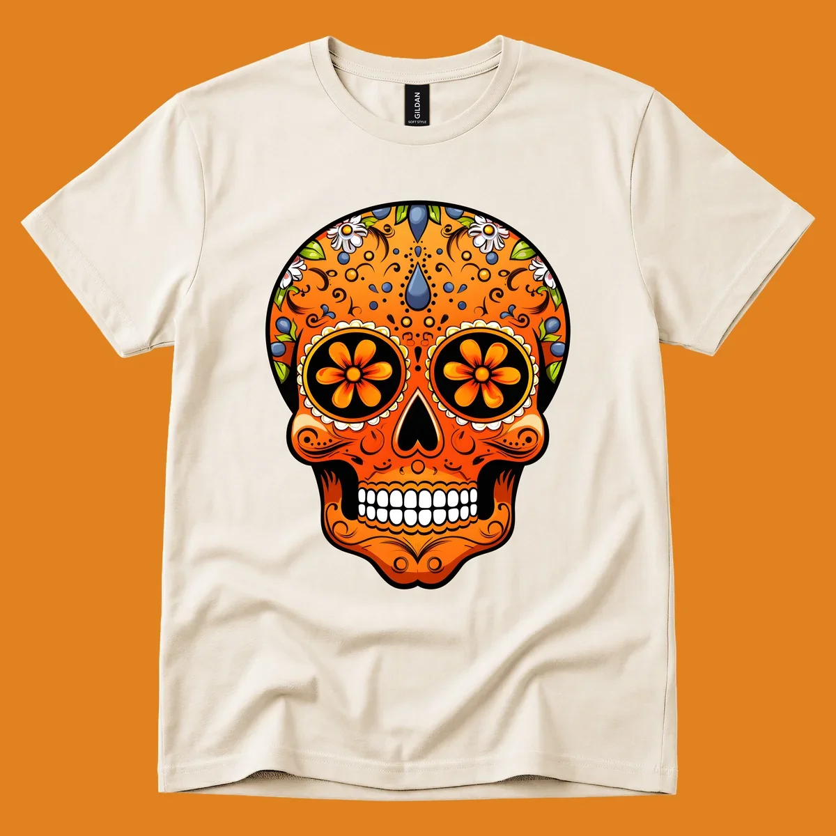 A vibrant orange calavera sugar skull with blue and white flowers, green leaves, and intricate swirling patterns.