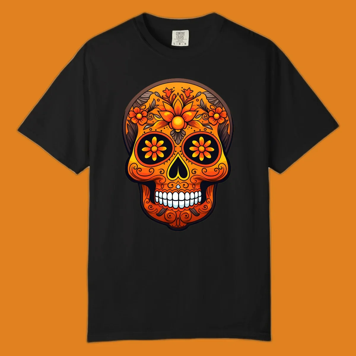 A vibrant floral calavera skull illustration with orange and yellow flowers, swirls, and a toothy grin.