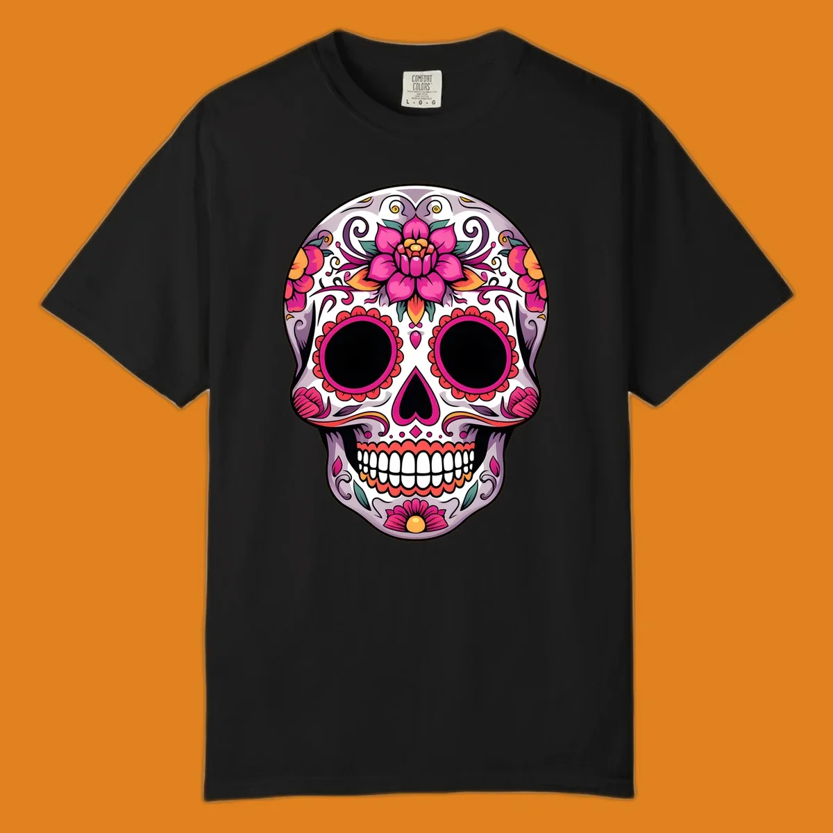 A vibrant, intricately decorated calavera sugar skull featuring pink lotus flowers, orange accents, and elegant scrollwork.