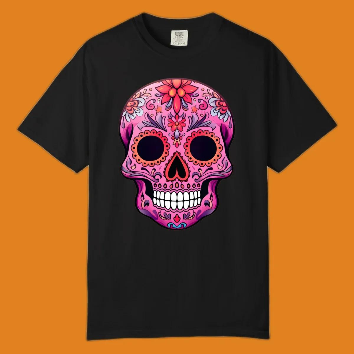 A vibrant pink calavera sugar skull design, adorned with intricate floral patterns, swirls, and stars. Features dark eye sockets, heart nose, and white teeth.
