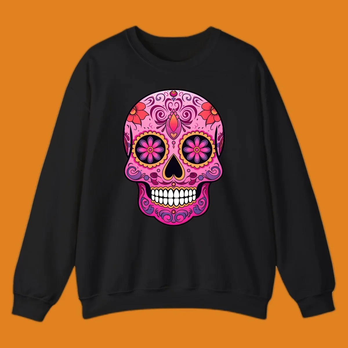 A vibrant pink and purple sugar skull, decorated with intricate floral patterns, swirls, and bright yellow and orange accents, featuring white teeth.
