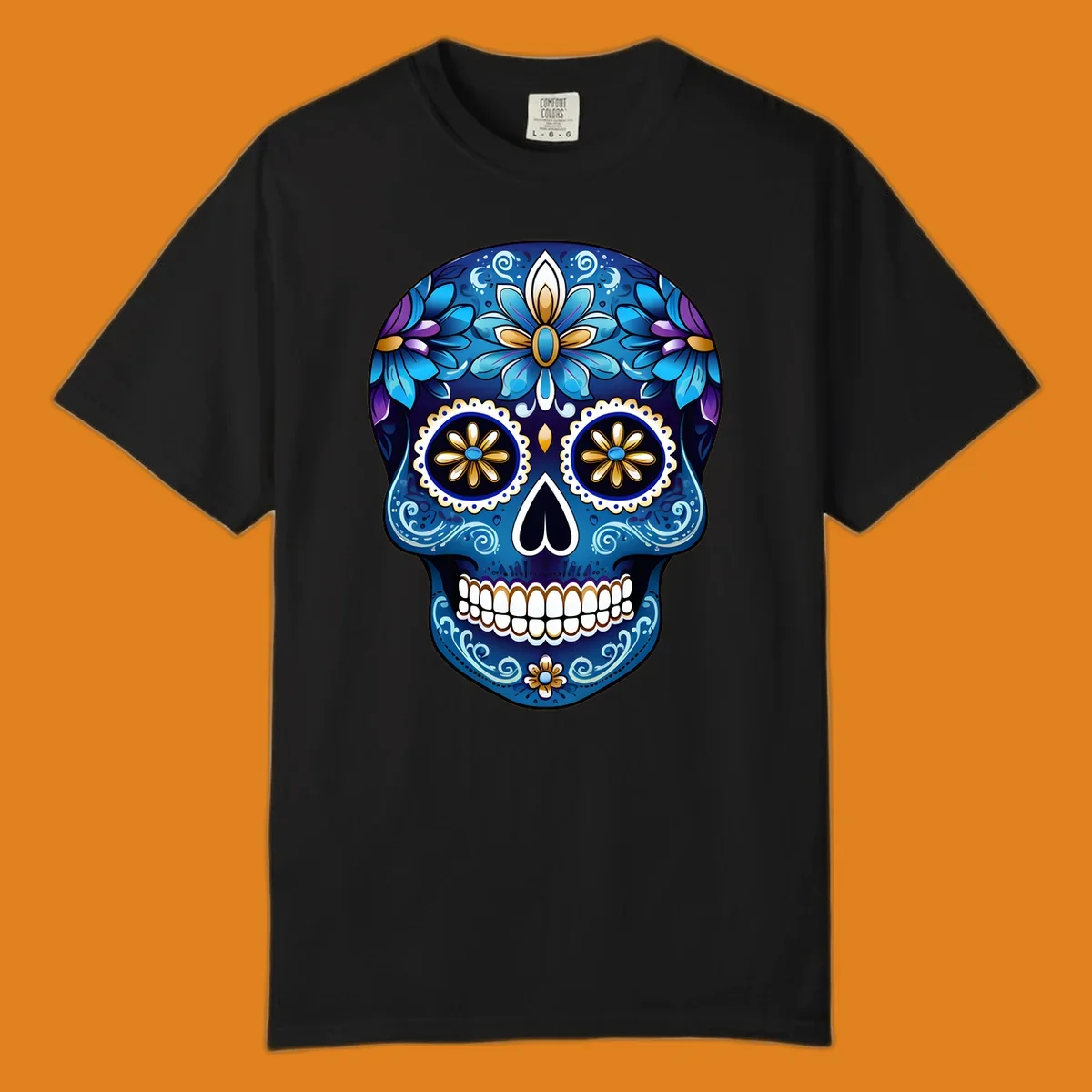 A vibrant blue floral sugar skull illustration with gold and purple accents, intricate scrollwork, and white teeth.