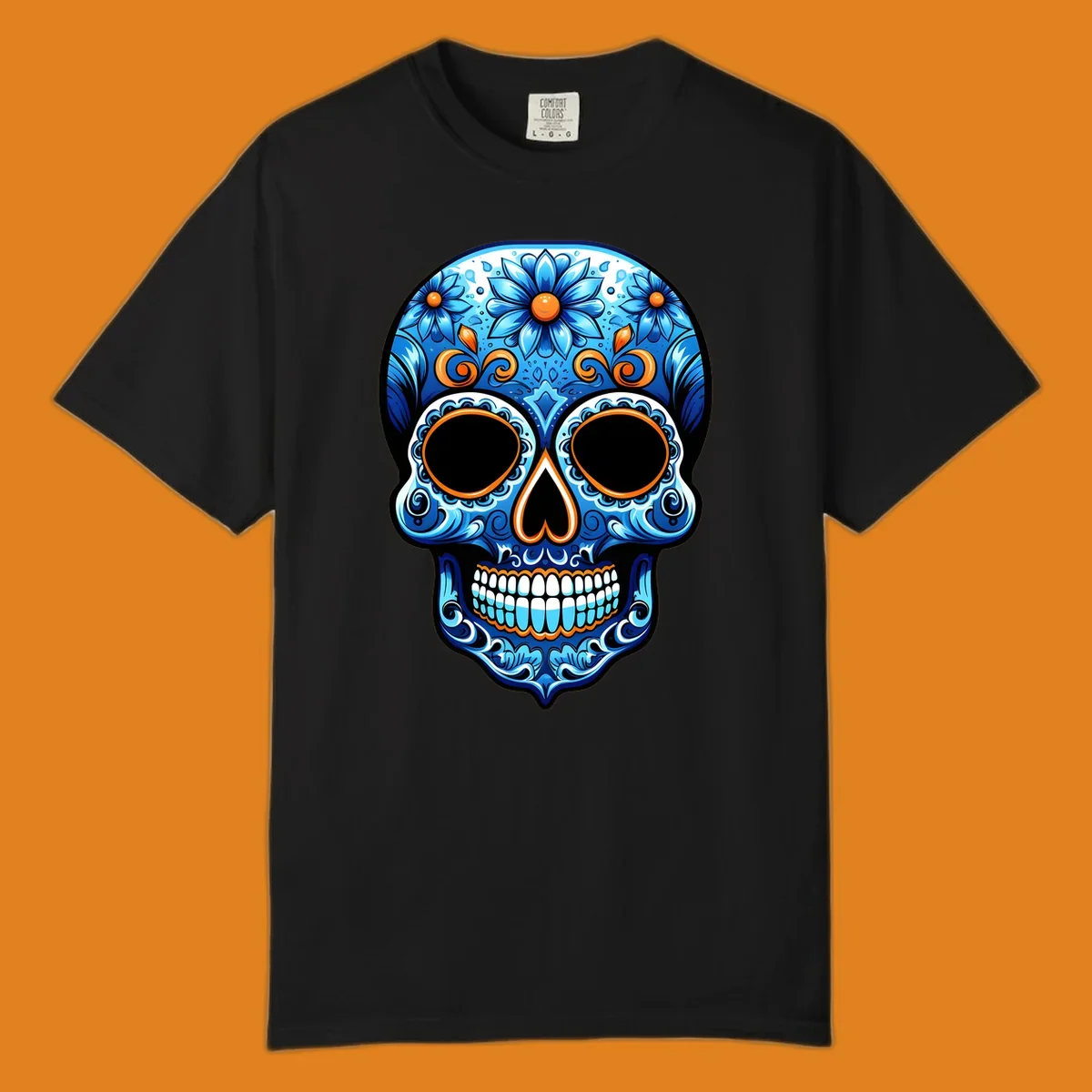 An ornate vibrant floral calavera skull illustration featuring shades of blue, orange accents, and intricate patterns.