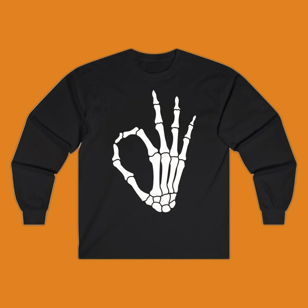 A white skeleton hand forms the 'okay' sign, with thumb and index finger creating a circle. A minimalist skeleton-hand-okay-sign.
