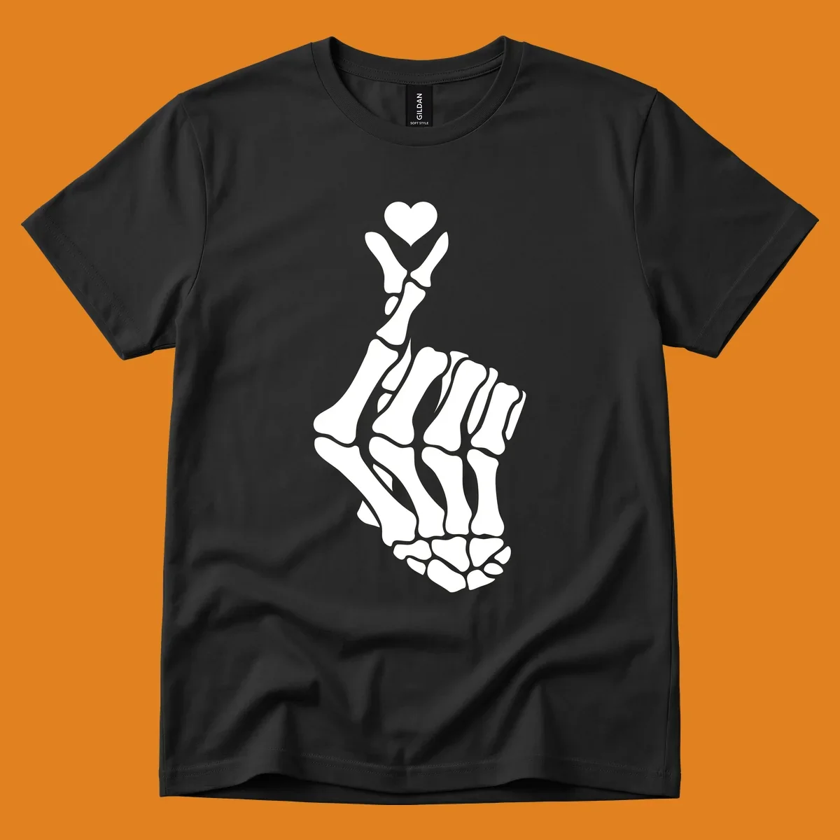 A white skeleton hand forms the Korean finger heart gesture, with a small heart shape at the fingertips. Concept: skeleton-finger-heart.