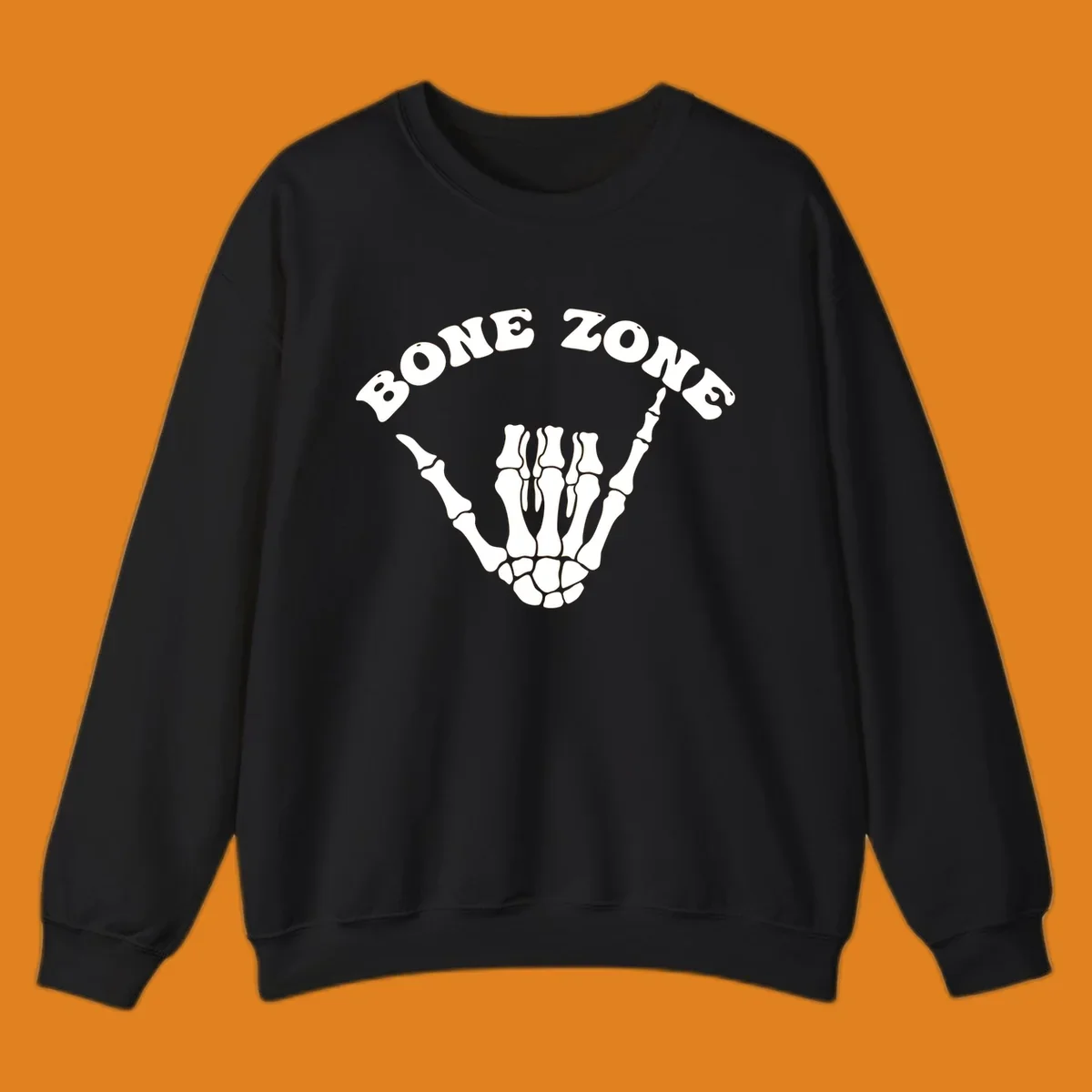 A white skeleton hand making a shaka sign with the arched text BONE ZONE above it, representing the bone-zone-shaka-skeleton concept.