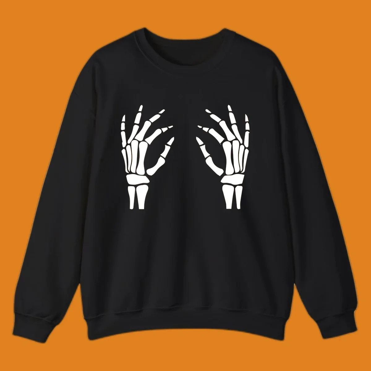 A pair of white skeletal hands reaching inwards on a dark background, illustrating the pair-skeletal-hands concept.