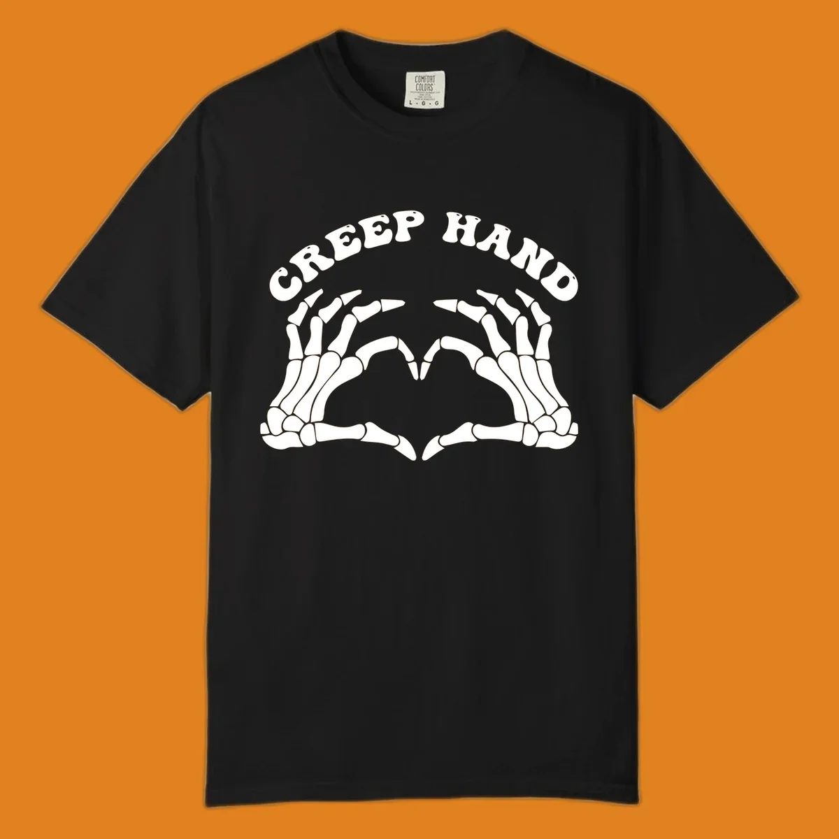 A white creep-hand-skeleton-heart design with two skeleton hands forming a heart shape below the arched text 'CREEP HAND'.