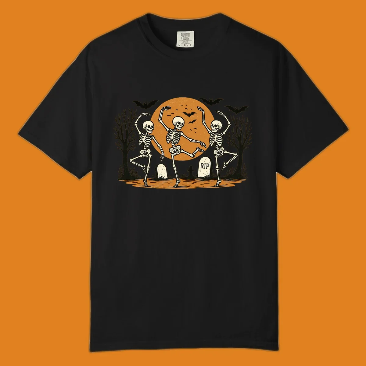 Dancing skeletons Halloween design with a full moon, bats, and gravestones.