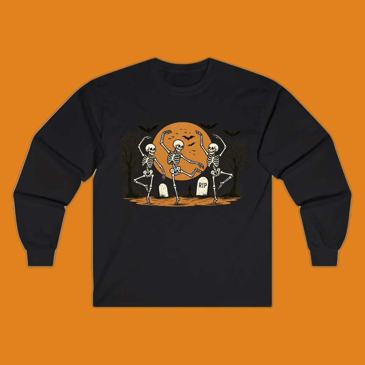 Dancing skeletons Halloween design with a full moon, bats, and gravestones.