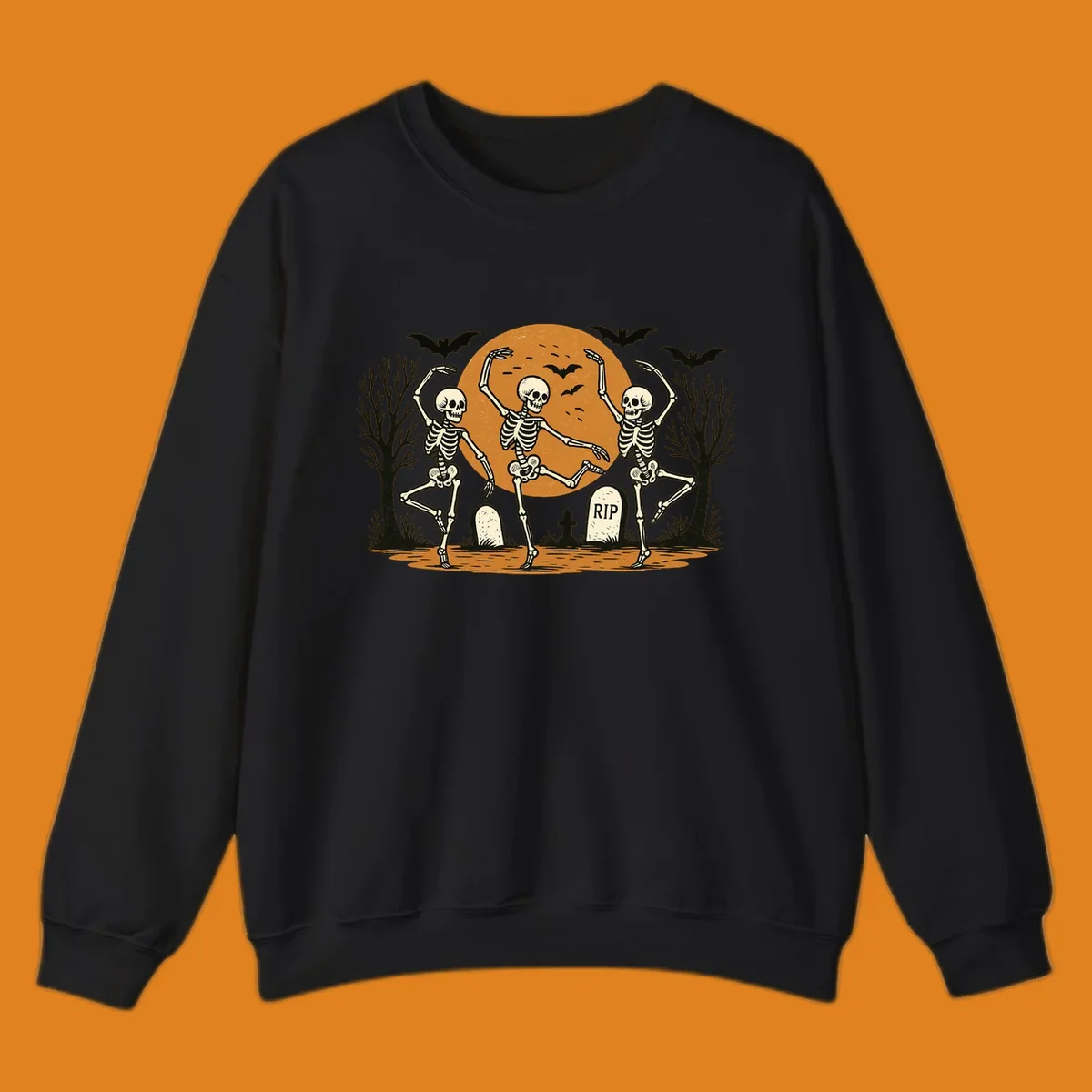 Dancing skeletons Halloween design with a full moon, bats, and gravestones.