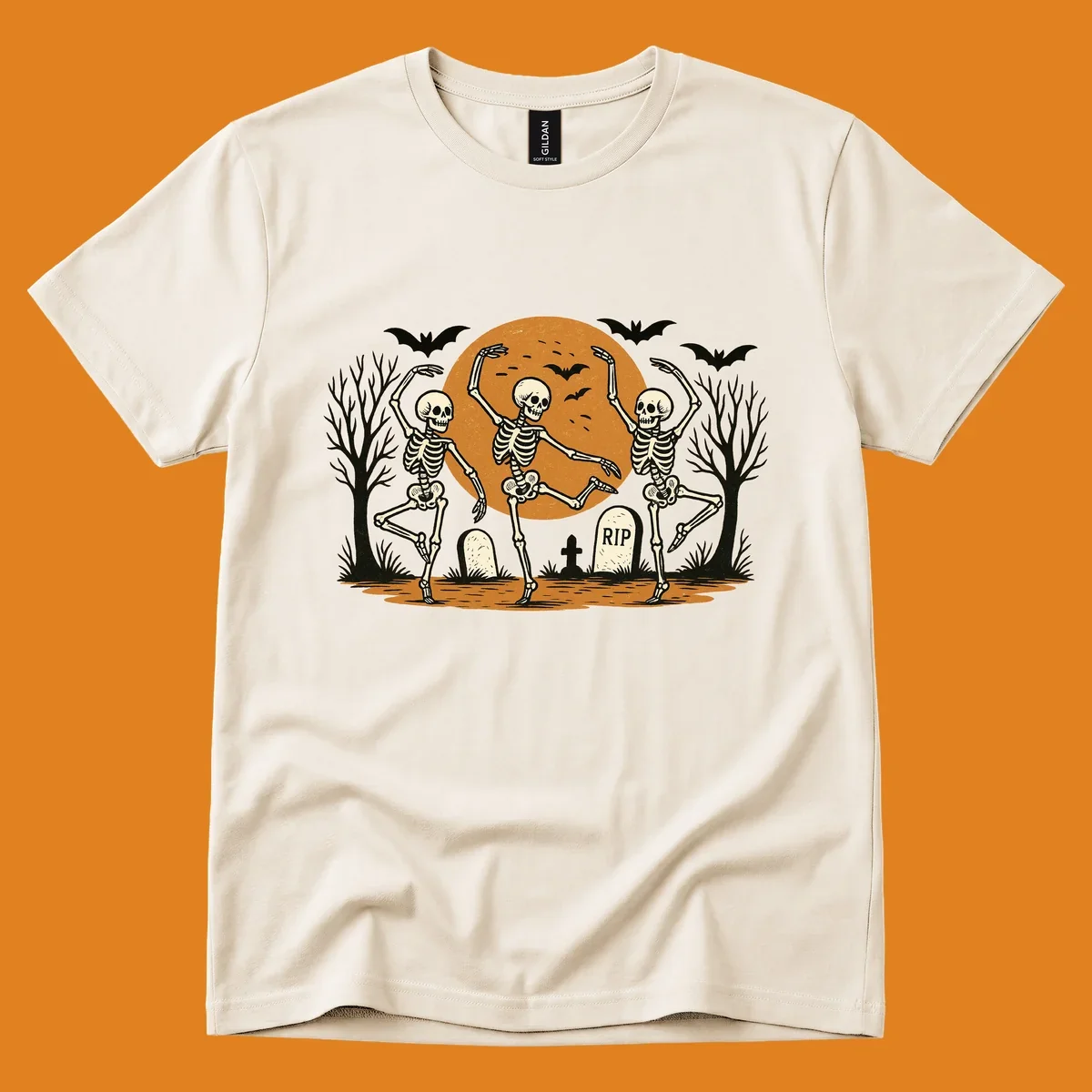 Dancing skeletons Halloween design with a full moon, bats, and gravestones.