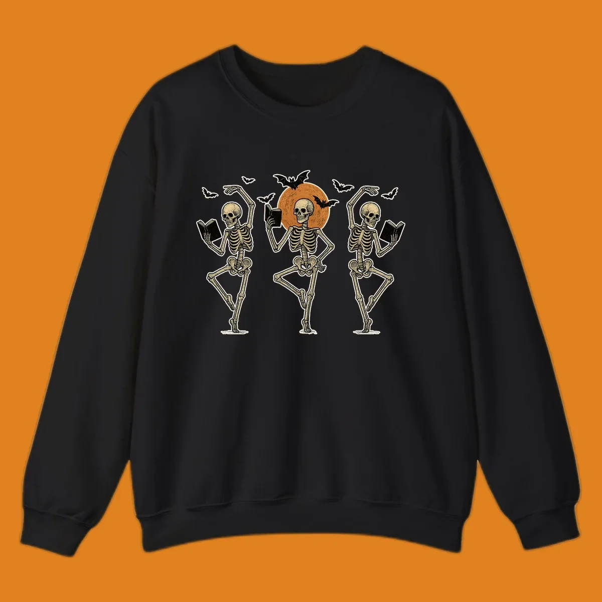 Dancing skeletons reading books under a moon with bats, skeleton-book-dance design.