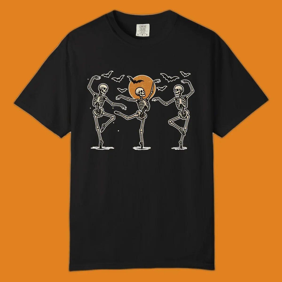 Vintage illustration of three dancing skeletons under a Halloween moon with bats, evoking a spooky ballet.