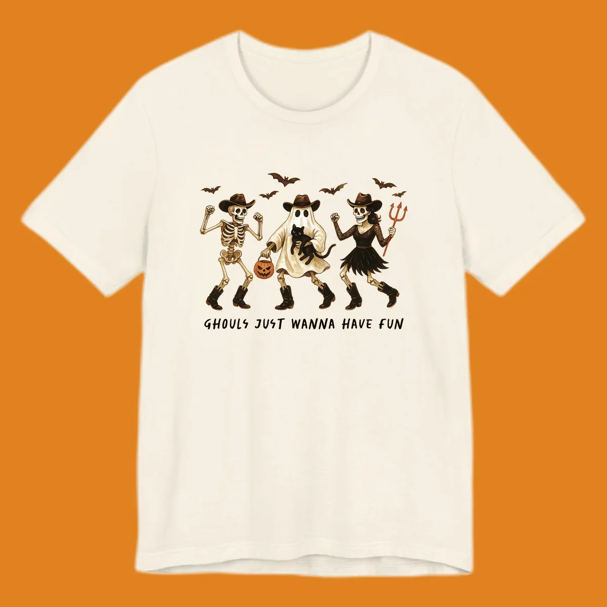 Halloween cowboy skeletons and ghost dancing with a cat and pumpkin, text reads Ghouls Just Wanna Have Fun.