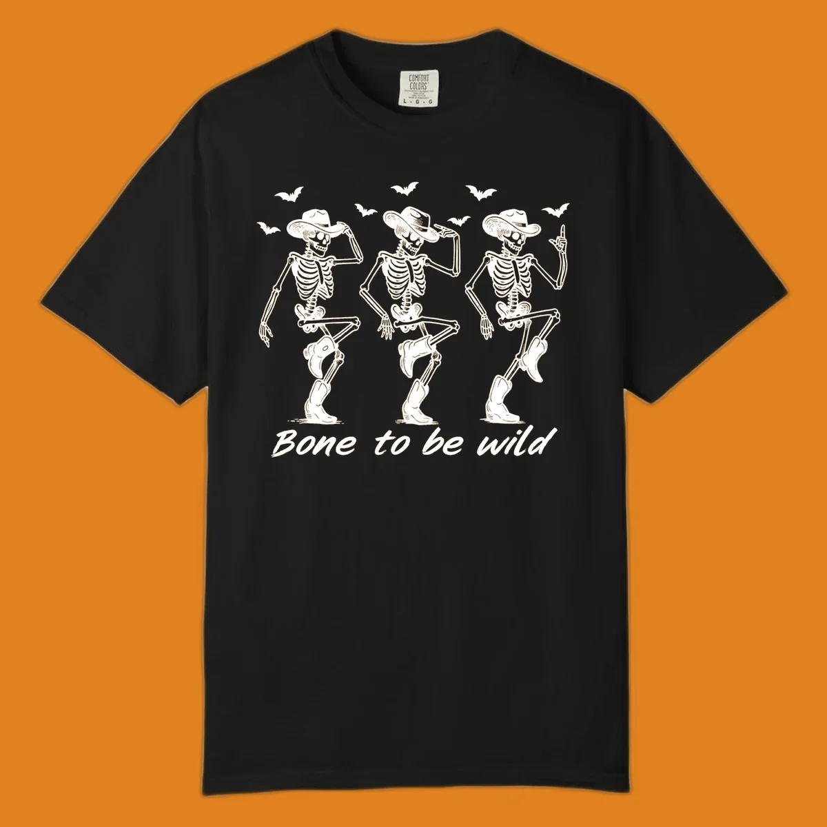 Three dancing skeletons in cowboy hats and boots with bats and the phrase 'Bone to be wild', bone-to-be-wild-cowboy