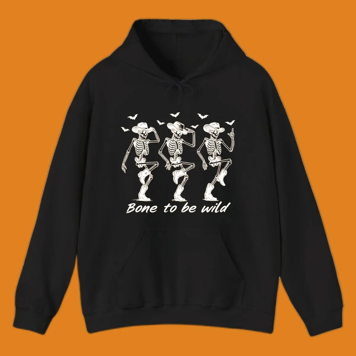 Three dancing skeletons in cowboy hats and boots with bats and the phrase 'Bone to be wild', bone-to-be-wild-cowboy