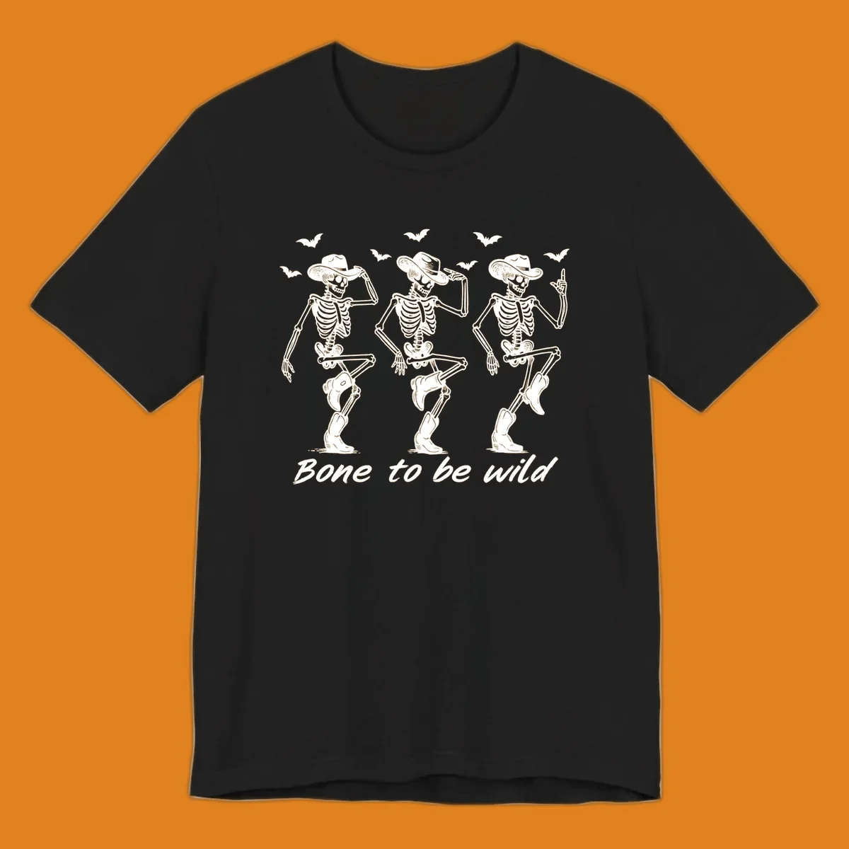 Three dancing skeletons in cowboy hats and boots with bats and the phrase 'Bone to be wild', bone-to-be-wild-cowboy