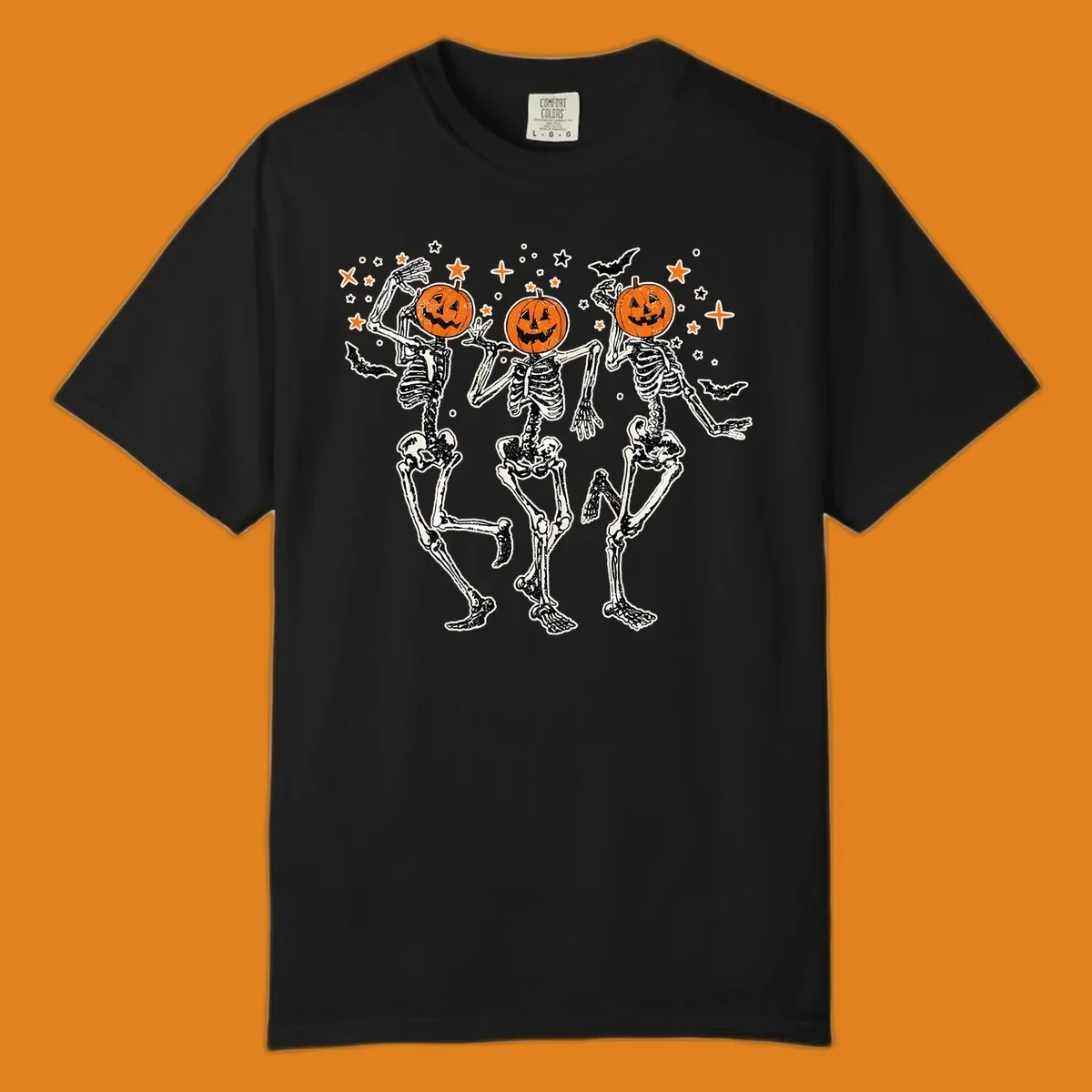 Dancing skeletons with pumpkin heads, bats, and stars illustration for Halloween.