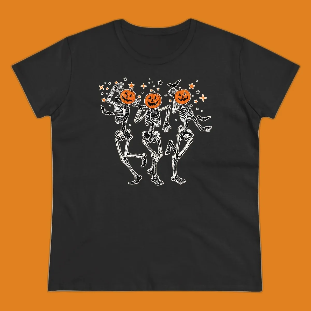Dancing skeletons with pumpkin heads, bats, and stars illustration for Halloween.
