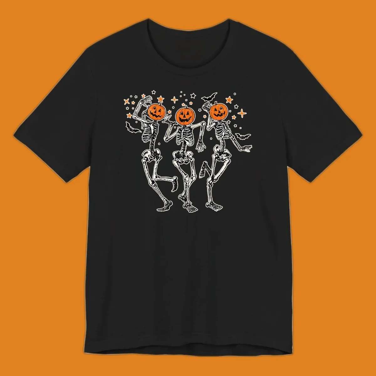 Dancing skeletons with pumpkin heads, bats, and stars illustration for Halloween.