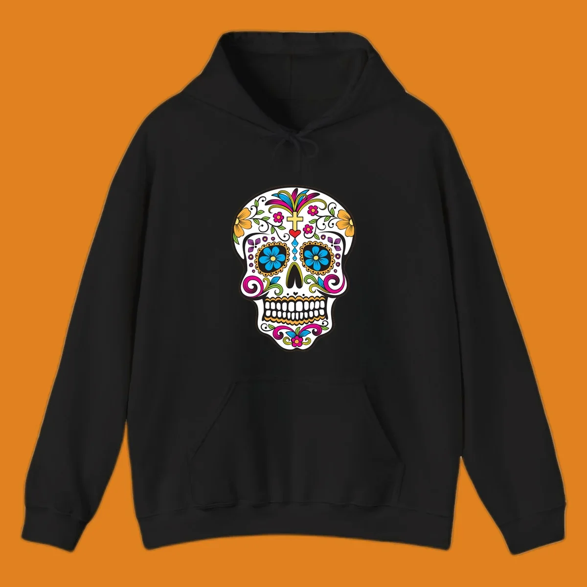 A vibrant sugar skull calavera illustration with colorful flowers, green leaves, a golden cross, and blue tears.