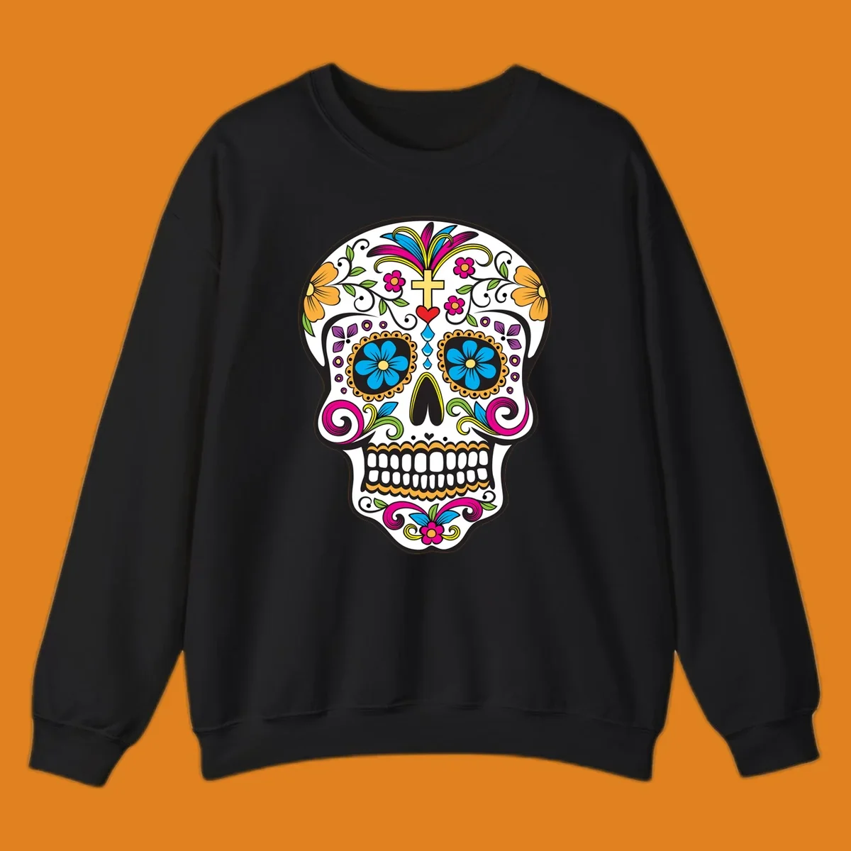 A vibrant sugar skull calavera illustration with colorful flowers, green leaves, a golden cross, and blue tears.