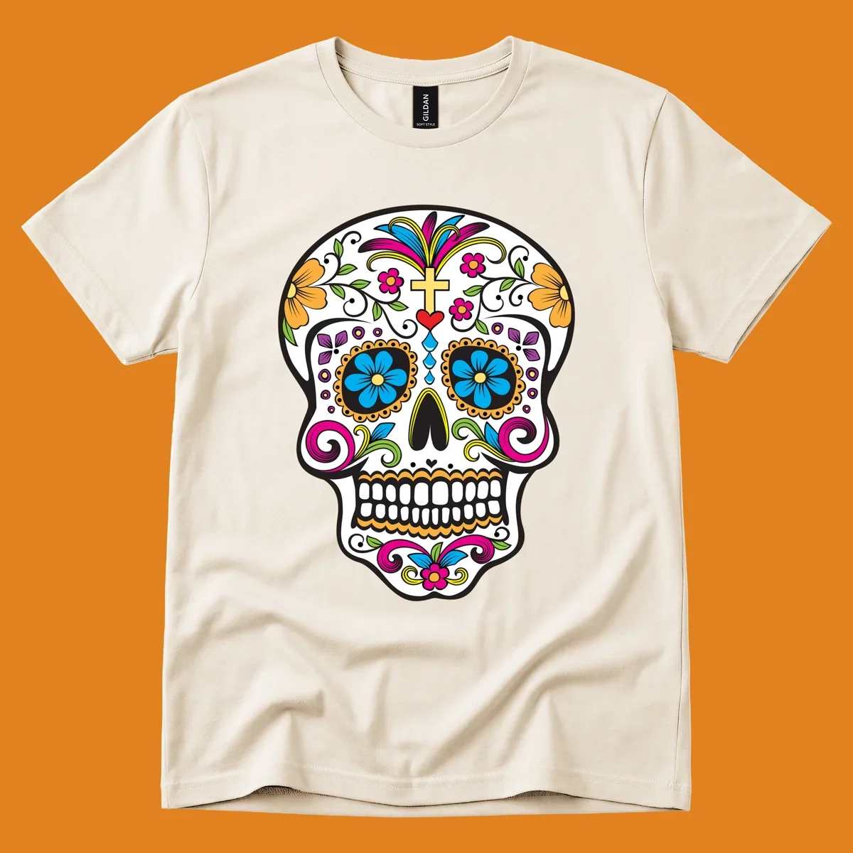 A vibrant sugar skull calavera illustration with colorful flowers, green leaves, a golden cross, and blue tears.