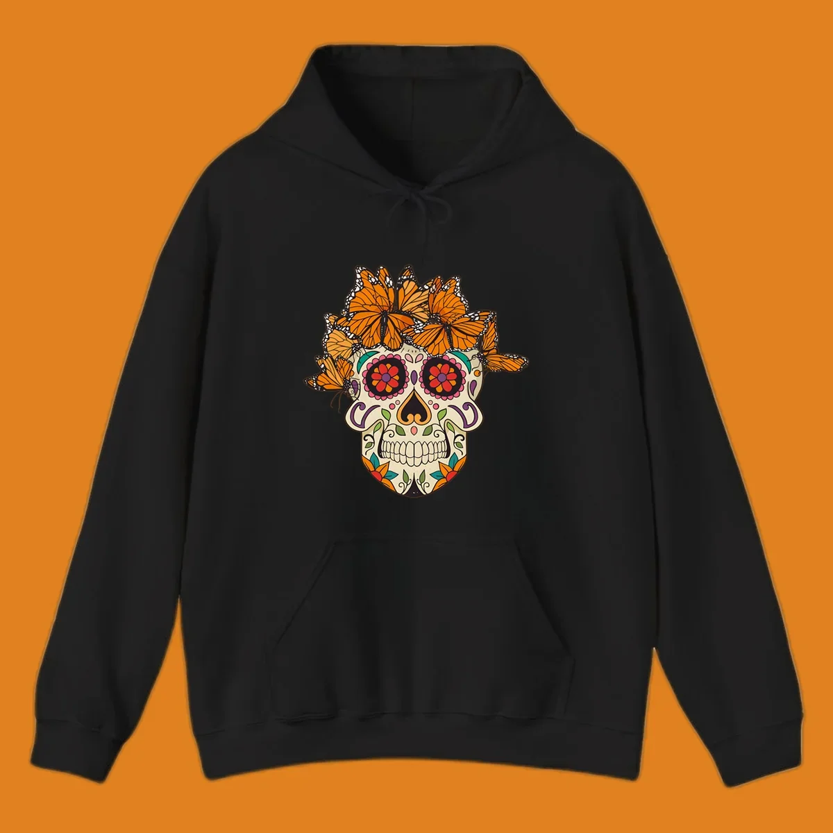 A cream sugar skull with colorful floral patterns and a crown of orange and black monarch butterflies.