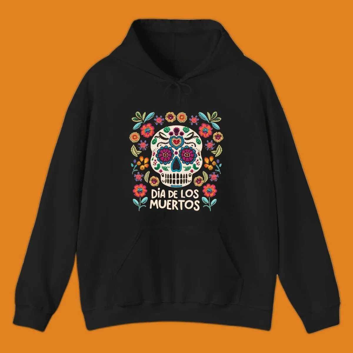 Embroidered-style Día de los Muertos sugar skull with colorful flowers and leaves, and text 'DÍA DE LOS MUERTOS'.