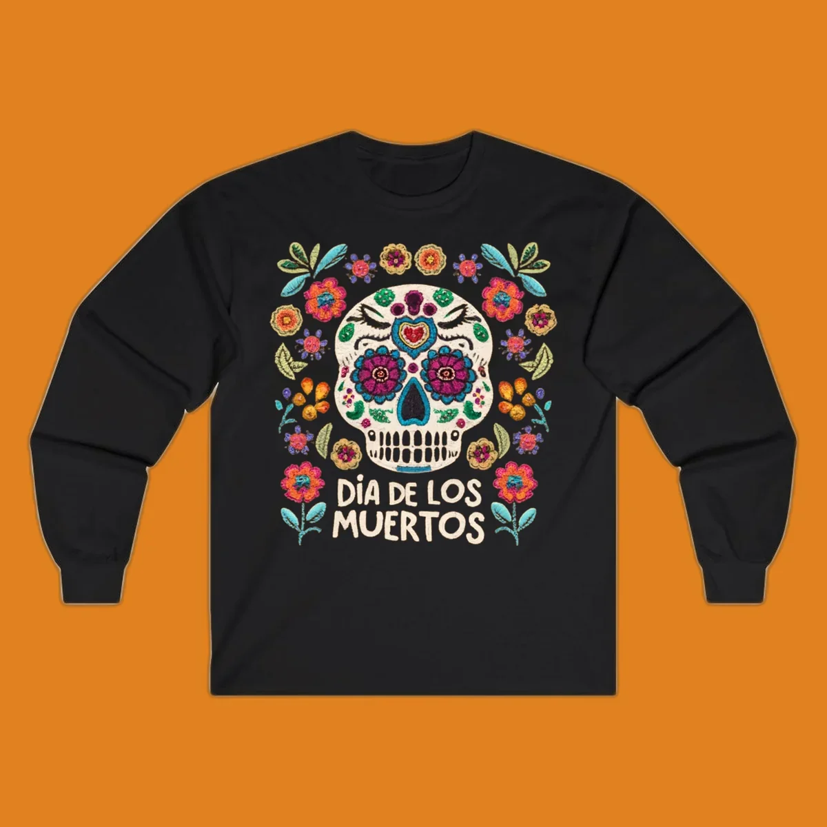 Embroidered-style Día de los Muertos sugar skull with colorful flowers and leaves, and text 'DÍA DE LOS MUERTOS'.